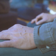 Hands resting on thighs during meditation